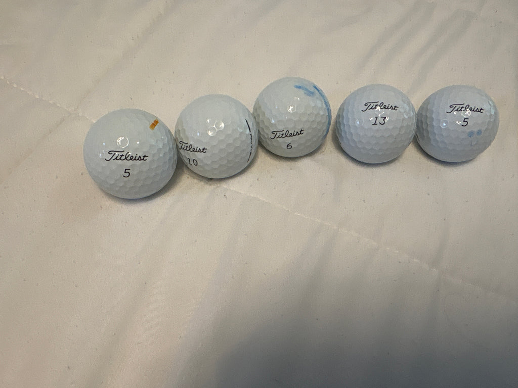 12 used 1st tier prov1 golf balls