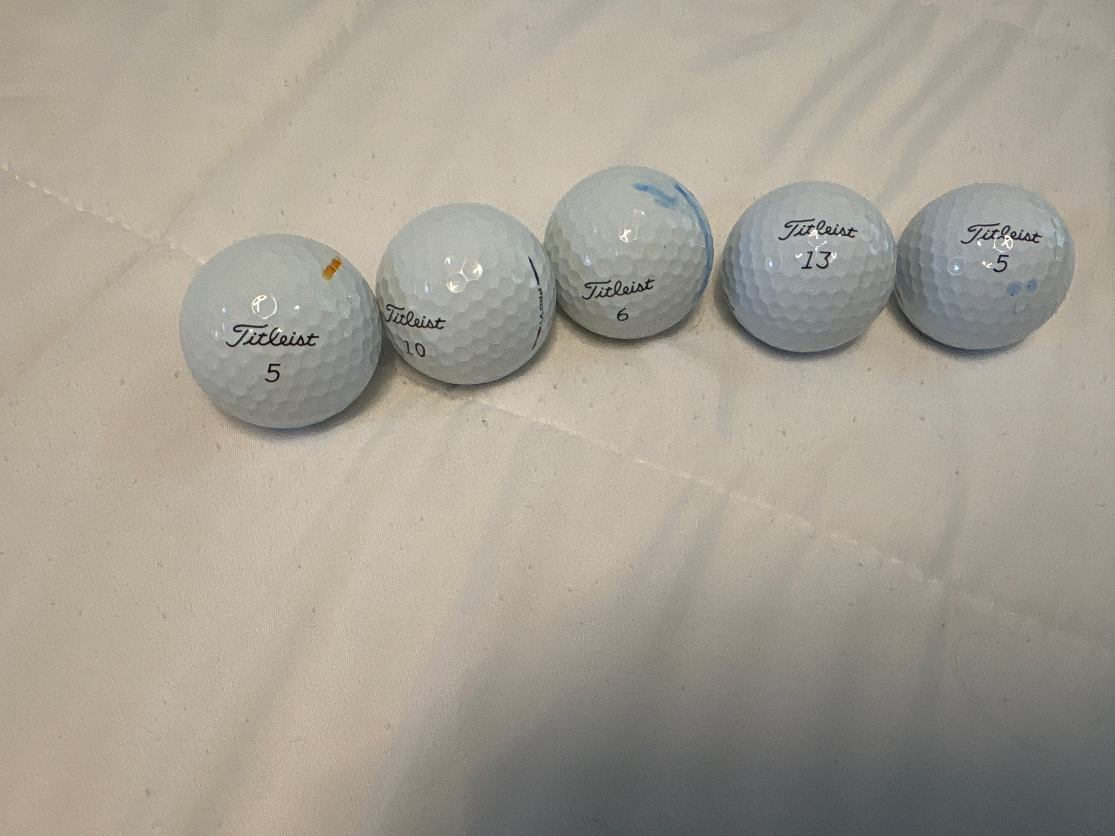 12 used 1st tier prov1 golf balls
