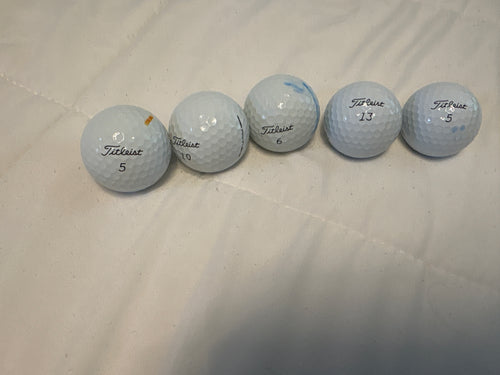 12 used 1st tier prov1 golf balls