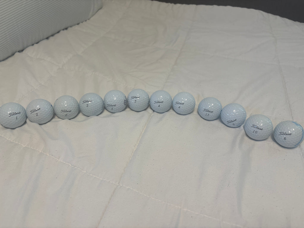 12 used 1st tier prov1 golf balls