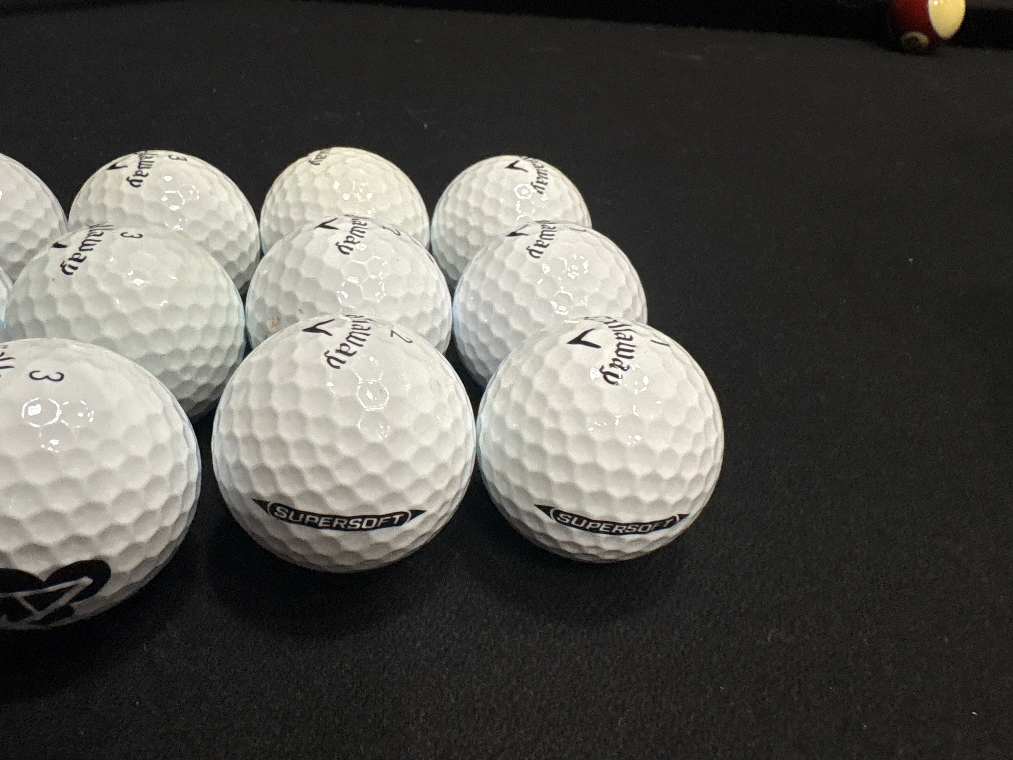 12 used 2nd tier Callaway supersoft golf balls